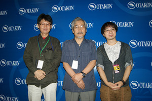 Shinkai, center, with directors Kazuya Murata (left) and Noboru Ishiguro (right)