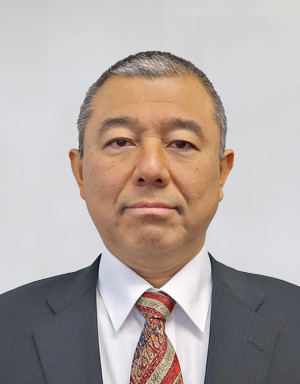 Heatshot of Tetsuhisa Seko in business attire