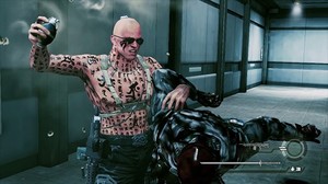 A bald Russian man with sunglasses who is covered in Sanskrit tattoos brandishes a grenade as he grapples with a soldier.
