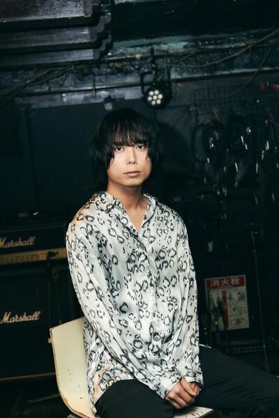 the dadadadys member Yohei Gima in costume as Jaguar Mori for the Nemurubaka film